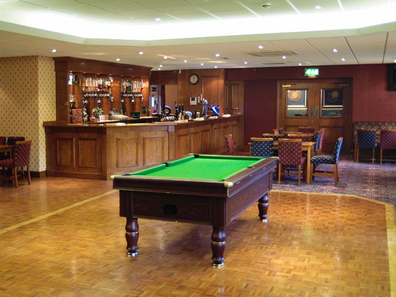Ease&Co Frimley Green WMC games area with bar and seating